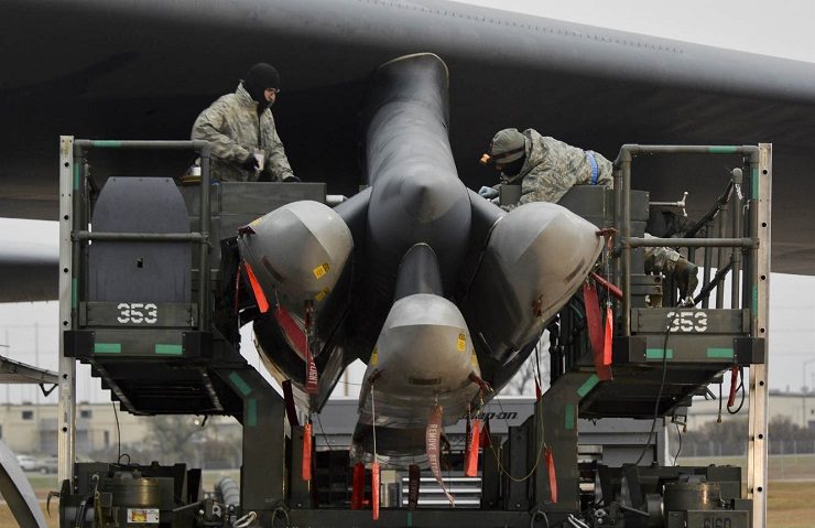 Click to enlarge arming plane with nukes