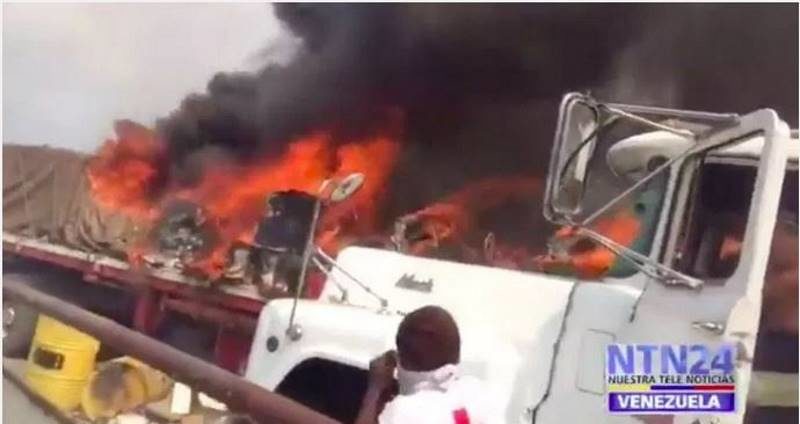 Click to enlarge burning aid truck venezuela opposition