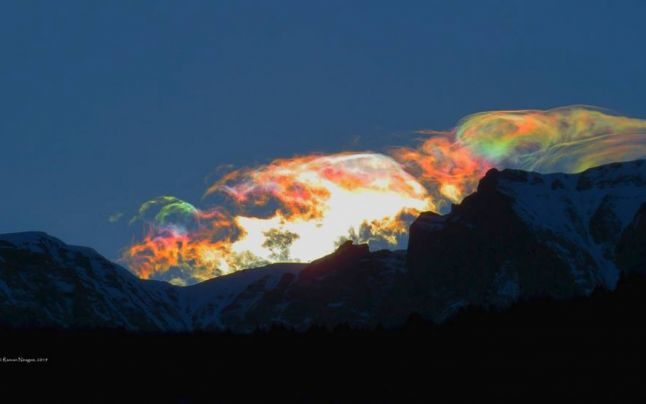 Click to enlarge Iridescent clouds in the Bucegi Mountains, Romania