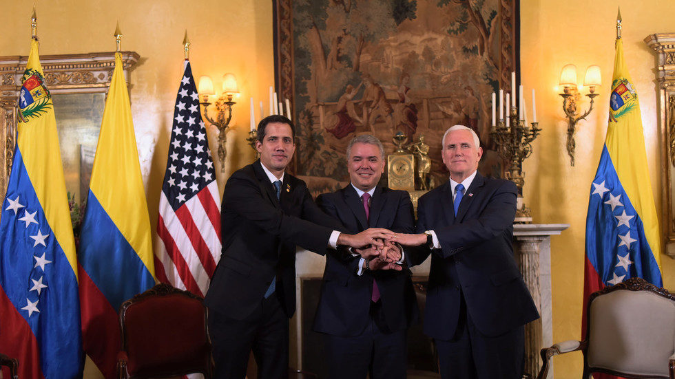Click to enlarge Juan Guaido pictured with Colombian President Ivan Duque and US Vice President Mike Pence at a meeting of the anti-Maduro Lima Group
