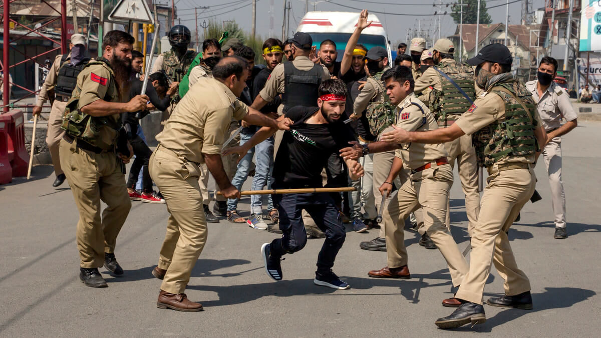 india police beat muslim