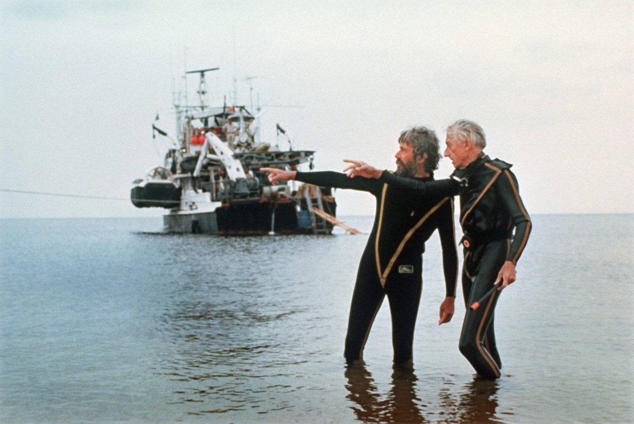 French explorer Jacques-Yves Cousteau (R) with his son Jean-Michel Cousteau (L) in the Amazon