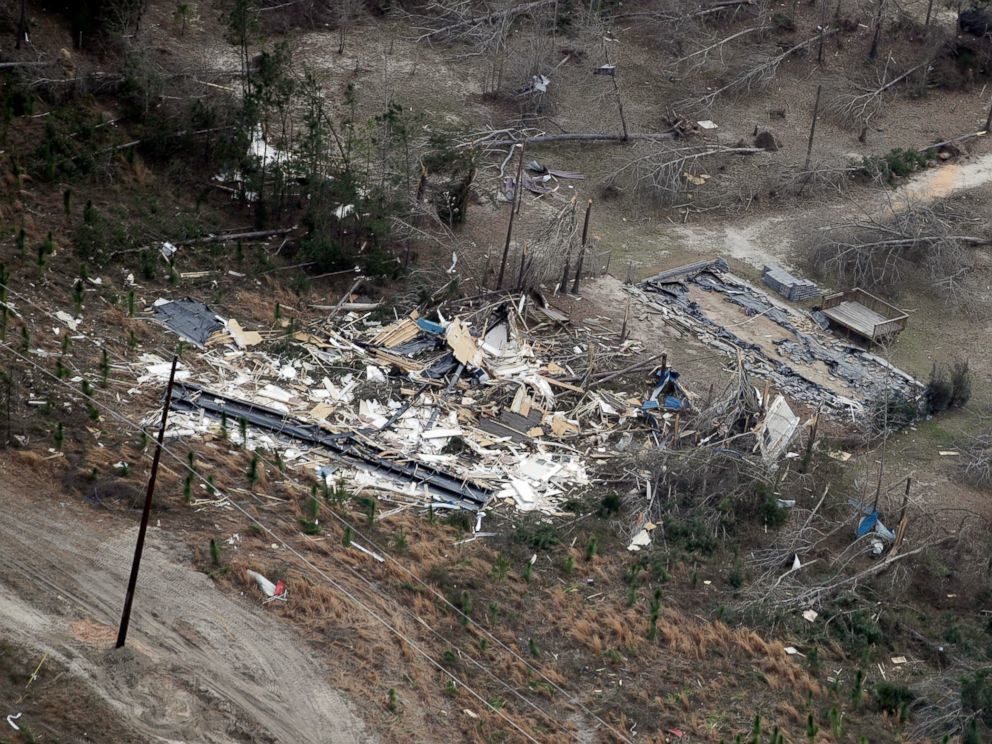 Click to enlarge A tornado damaged home is shown as President Donald Trump flies above en route to Auburn, Ala., Friday, March 8,