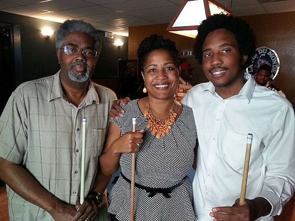 Victor McElhaney, right, is pictured with his father Clarence and mother, Councilmember Lynette McElhaney