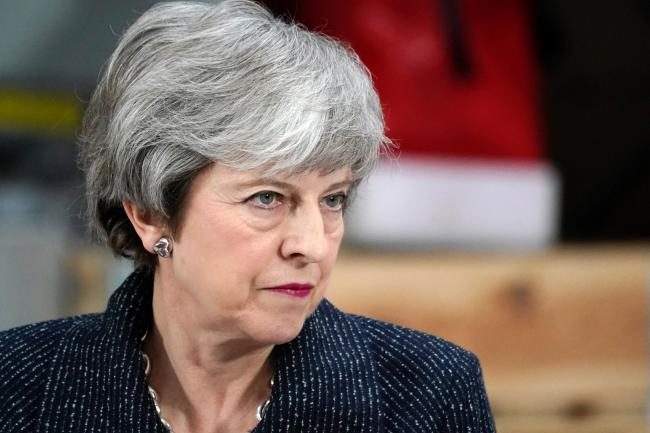 Click to enlarge Theresa May