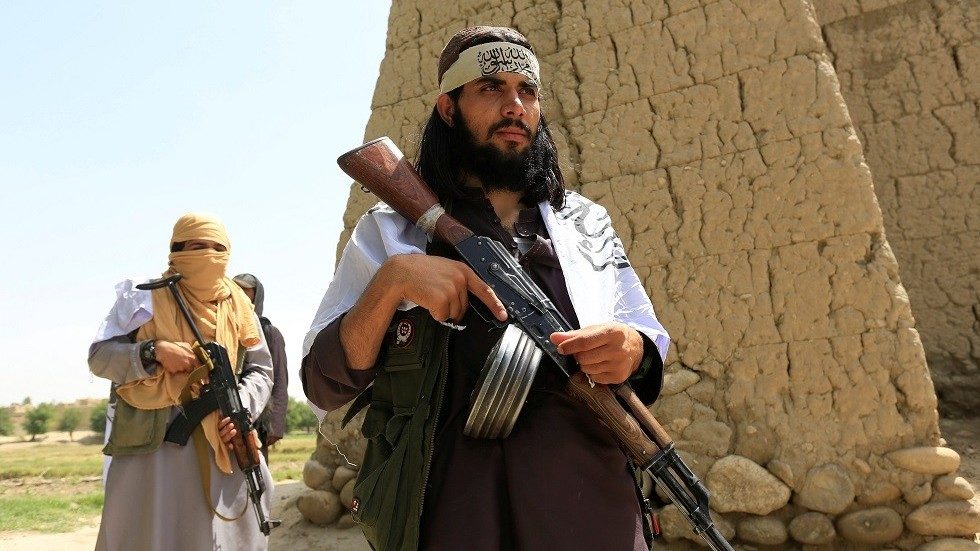 Click to enlarge Taliban fighters