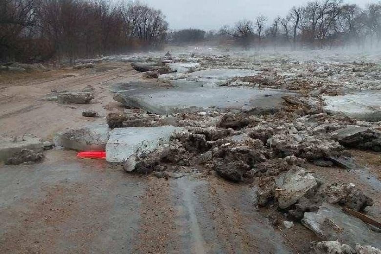 Click to enlarge Ice blocks brought by flood waters lie on the road in Howard County, Nebraska, US, on March 13, 2019