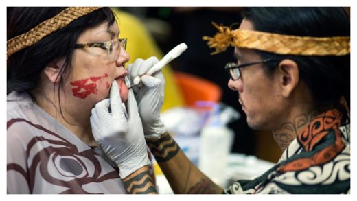 Click to enlarge Tattoo Artist at Work