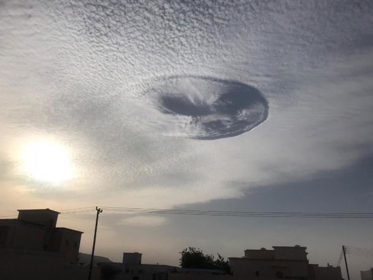Click to enlarge UAE hole punch cloud or fallstreak hole