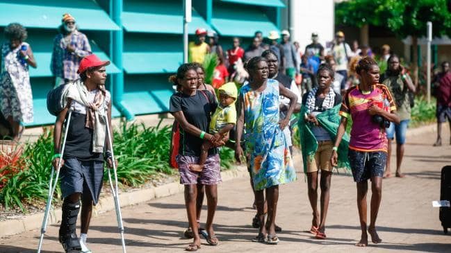 Click to enlarge Evacuees from Groote Eylandt after flying to Darwin ahead of Cyclone Trevor