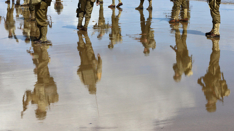 Click to enlarge D-Day landing reenactment Omaha Beach