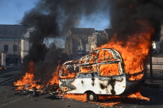 Click to enlarge burning caravan