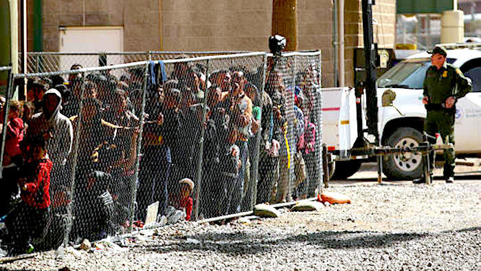 Click to enlarge migrants-fence