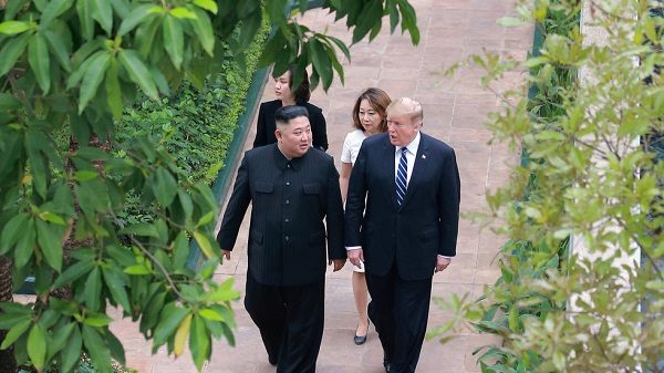 Click to enlarge Kim Jong Un walks with U.S. President Donald Trump