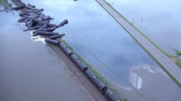 Click to enlarge Tanker cars from a freight train carrying crude oil after a derailment, Iowa, US