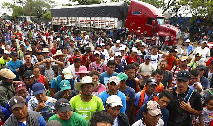 Click to enlarge Migrants