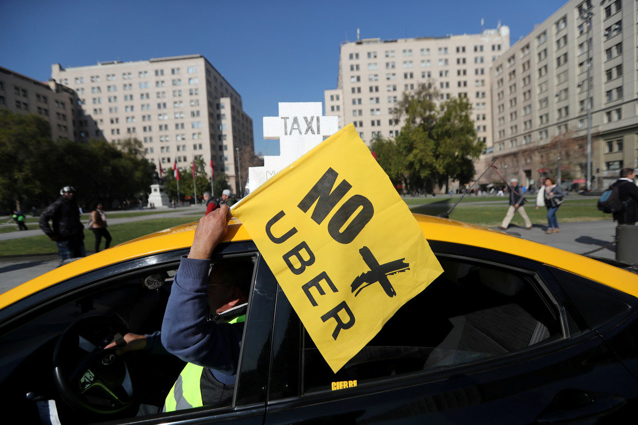 Click to enlarge An anti-Uber protest