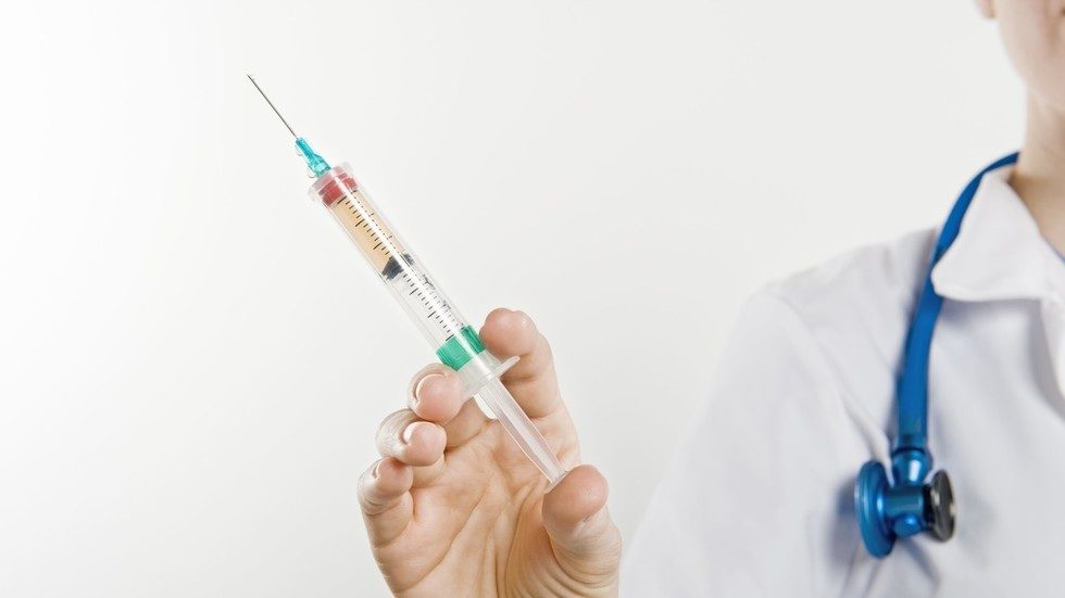 doctor with vaccine