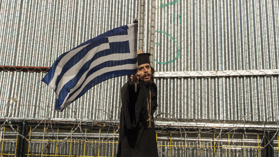 Click to enlarge Greek protester