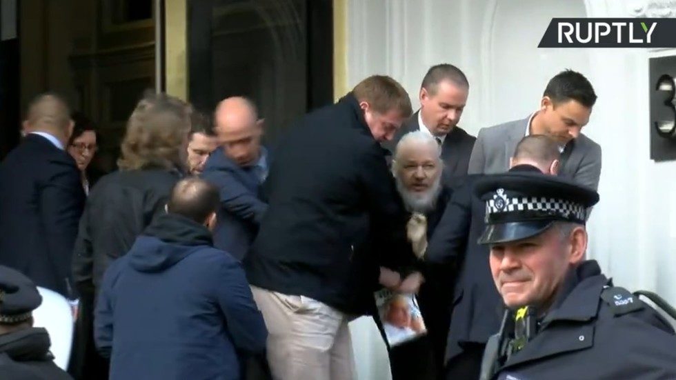Click to enlarge Assange