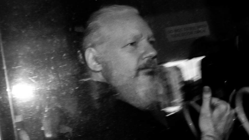 Click to enlarge assange arrest
