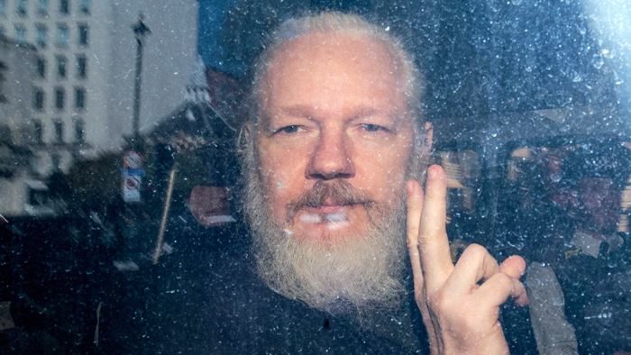 Click to enlarge Assange