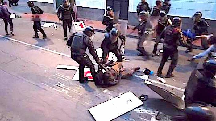 Click to enlarge Quito police riot
