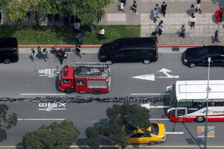 A major road in the centre of Taipei is seen damaged after an earthquake in Taipei, Taiwan