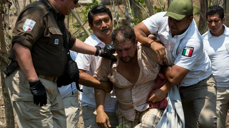 Click to enlarge migrant detained mexico