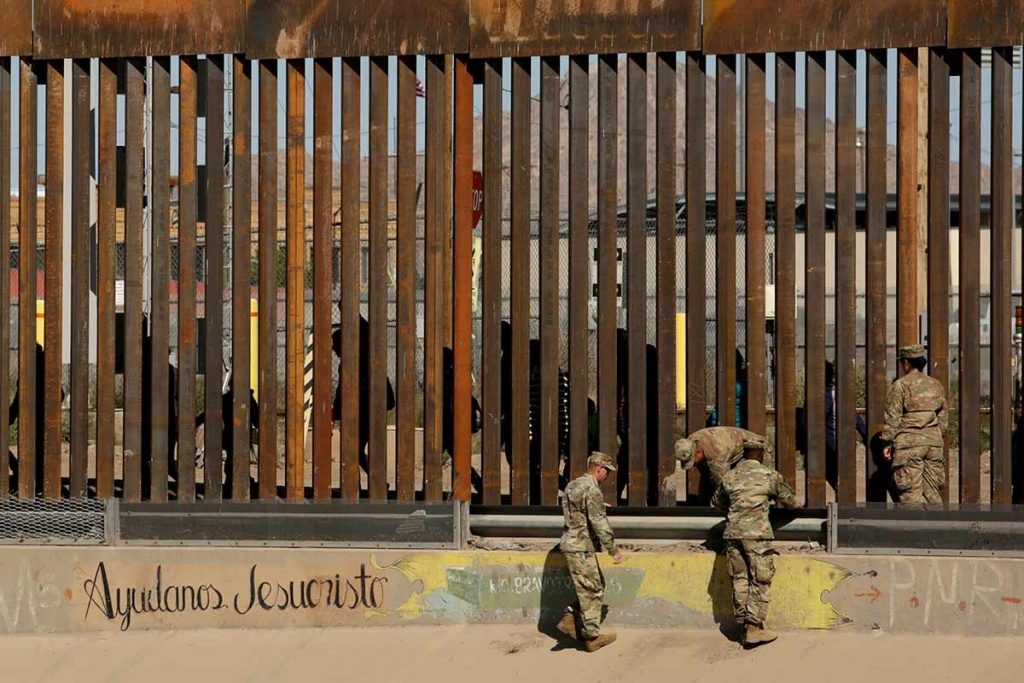Trump border wall migrants