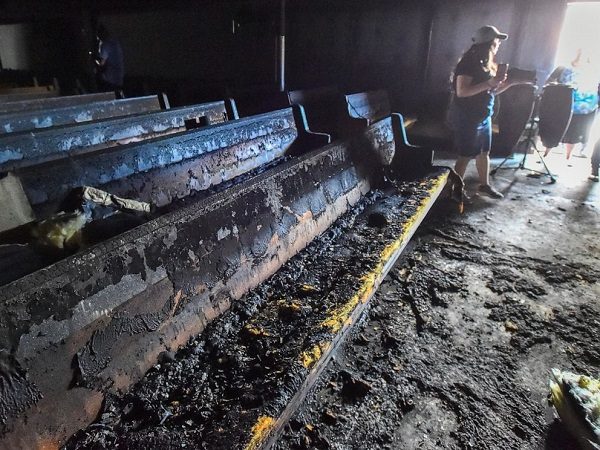 Click to enlarge Burnt church pews