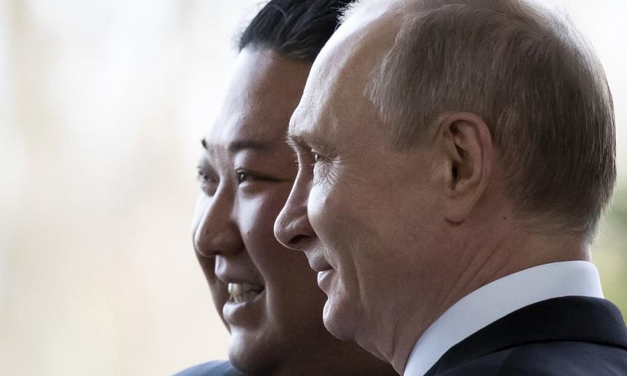 Click to enlarge kim putin