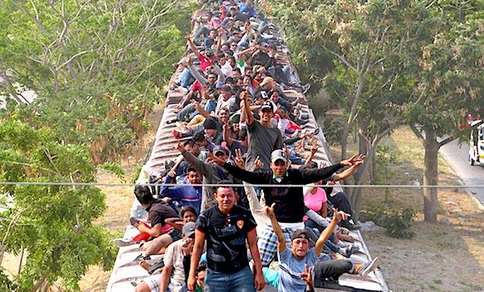 Click to enlarge migrants aboard train
