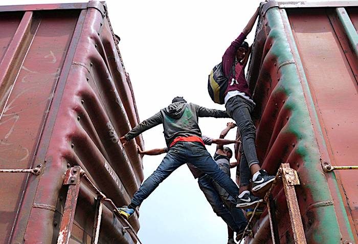 Click to enlarge Migrants train