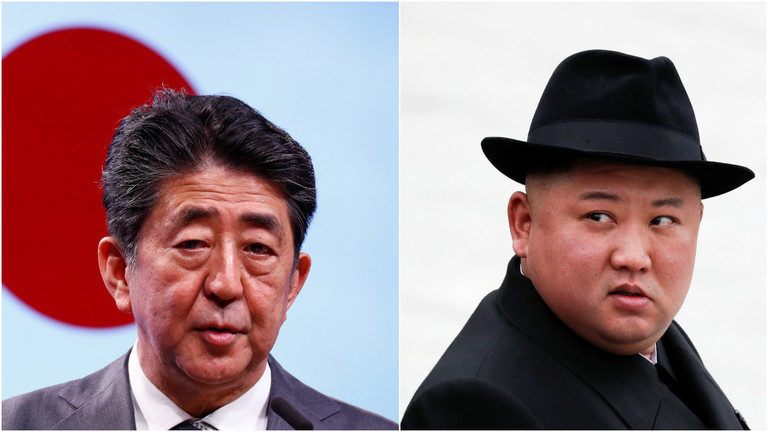 Click to enlarge shinzo abe and kim jong-un