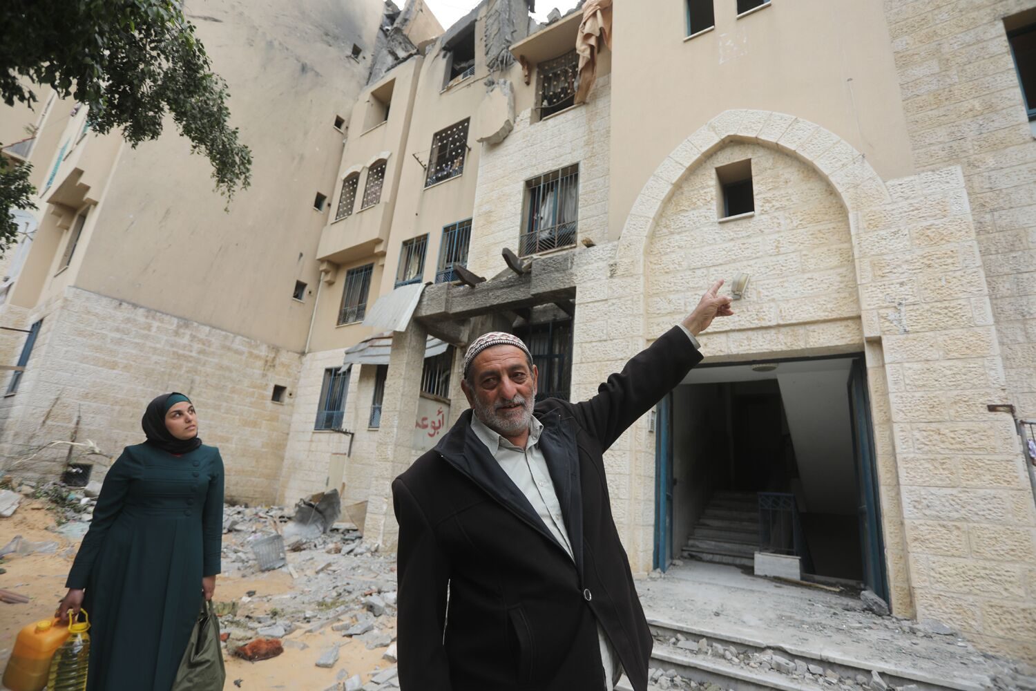 Click to enlarge bombed apartment building IDF survivors