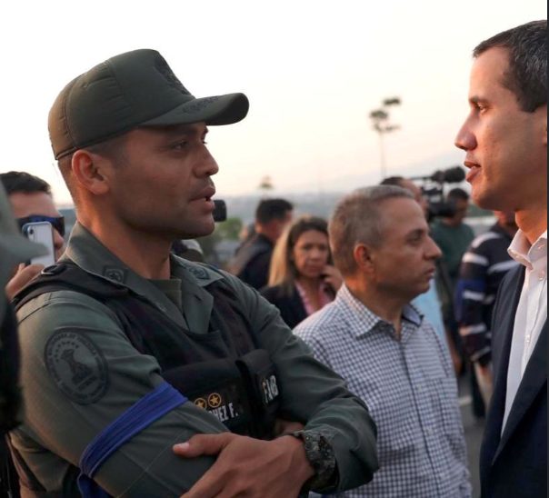 National Guard Lieutenant Colonel Ilich Sanchez and Juan Guaido on