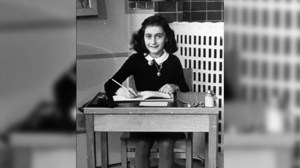 anne frank at desk