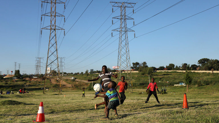 Click to enlarge playing soccer