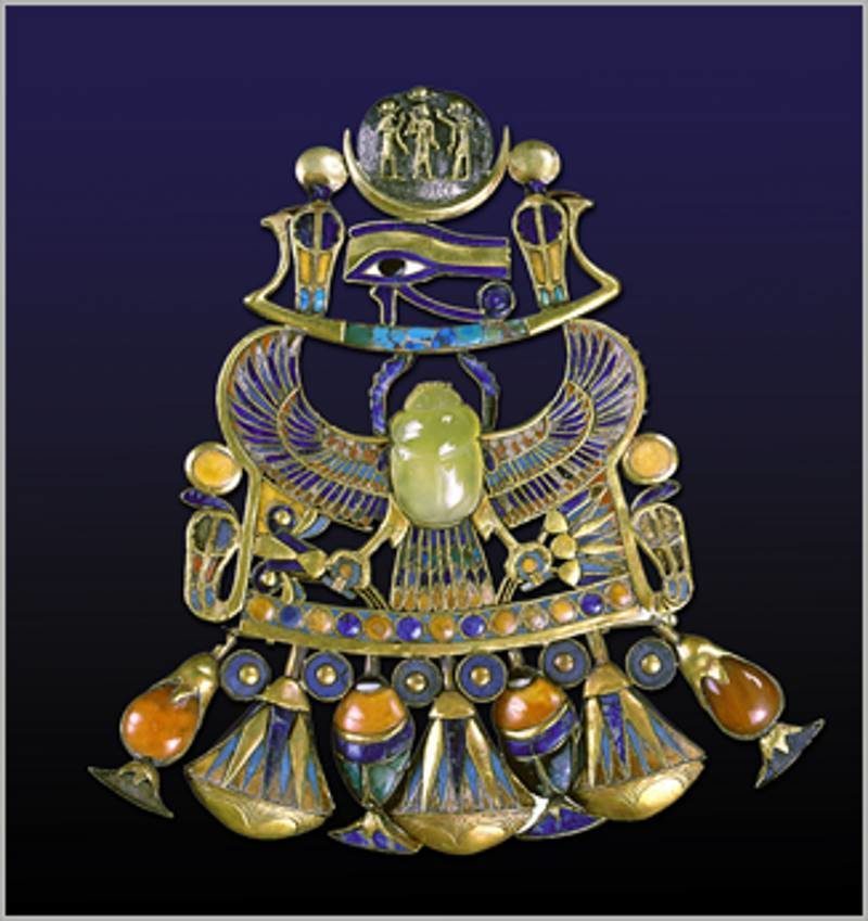 Mystery of the strange yellow glass adorning King Tut's winged scarab ...