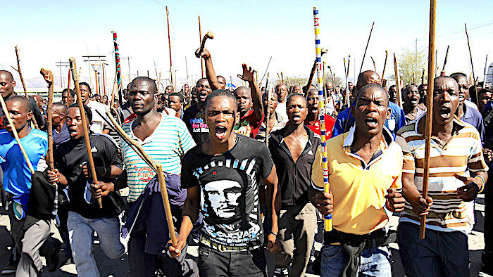 Click to enlarge SA mine workers