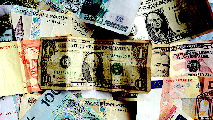 Click to enlarge Pile of different monies