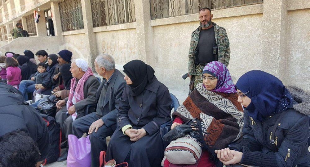 Click to enlarge Syrian refugees