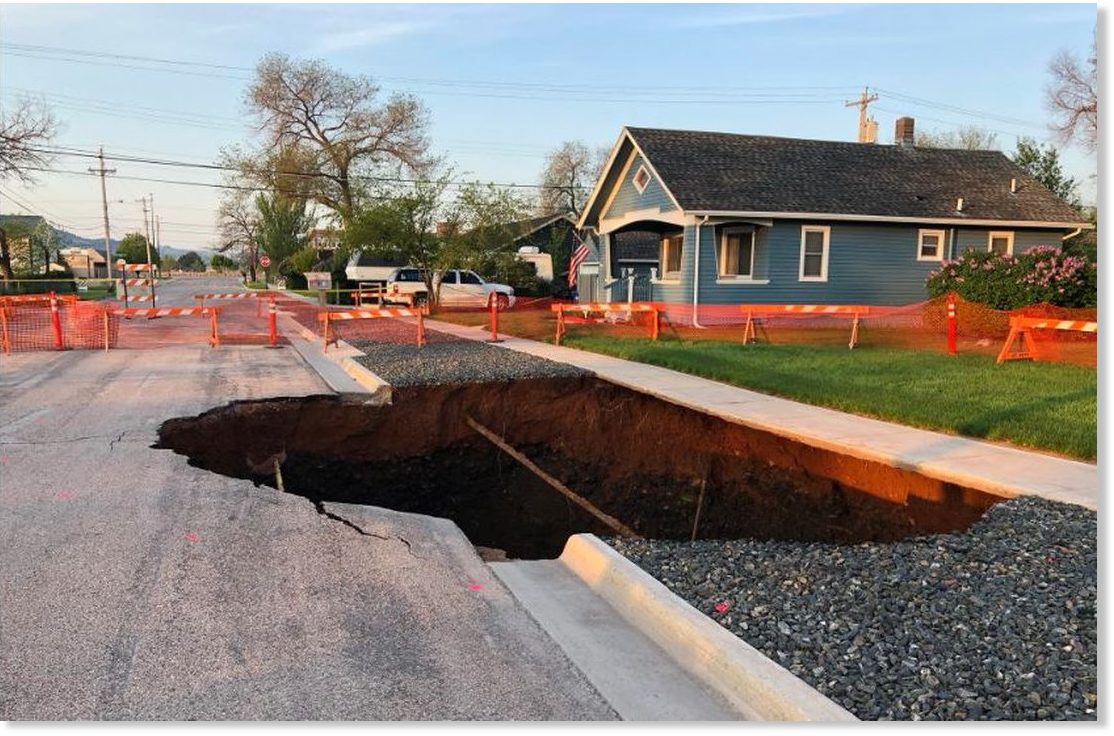Growing 40 feet deep sinkhole opens in front of home in Rapid City