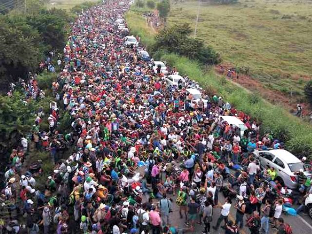 Click to enlarge migrant caravan mexico
