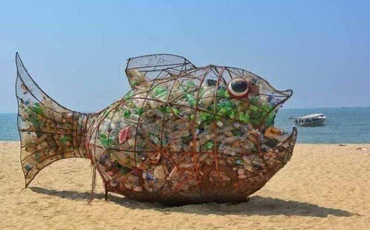 fish sculpture beach trash
