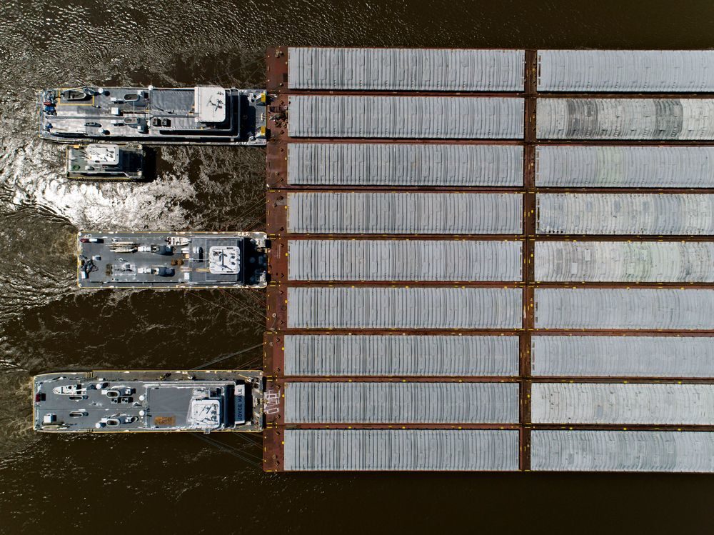 Click to enlarge Tug boats idle along the shores of the Mississippi River as they wait to push barges north, on June 7.