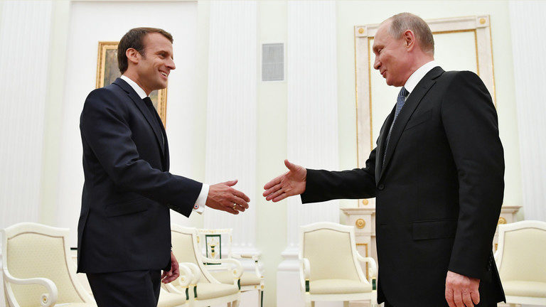 Click to enlarge putin and macron