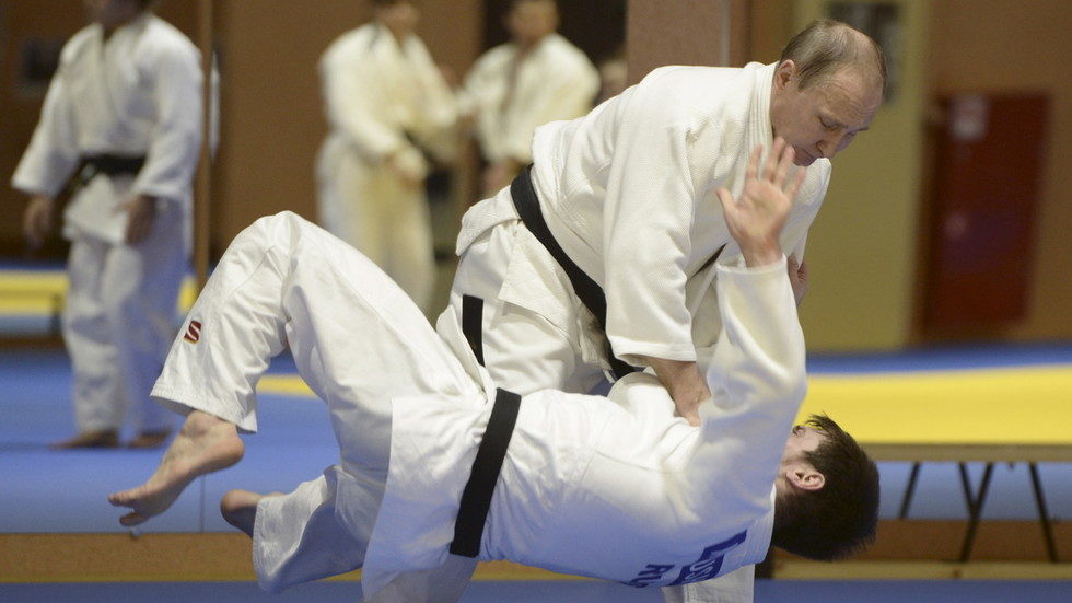 Vladimir Putin practises with national judo team