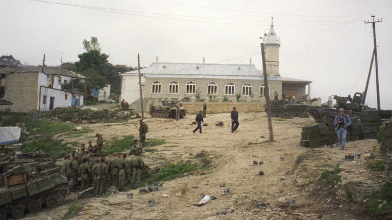 Click to enlarge Police officers and militiamen in Dagestan